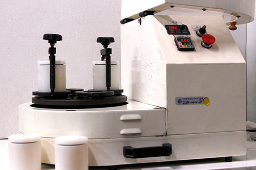 Image of machine for research and development of mass production of industrial glass powder material